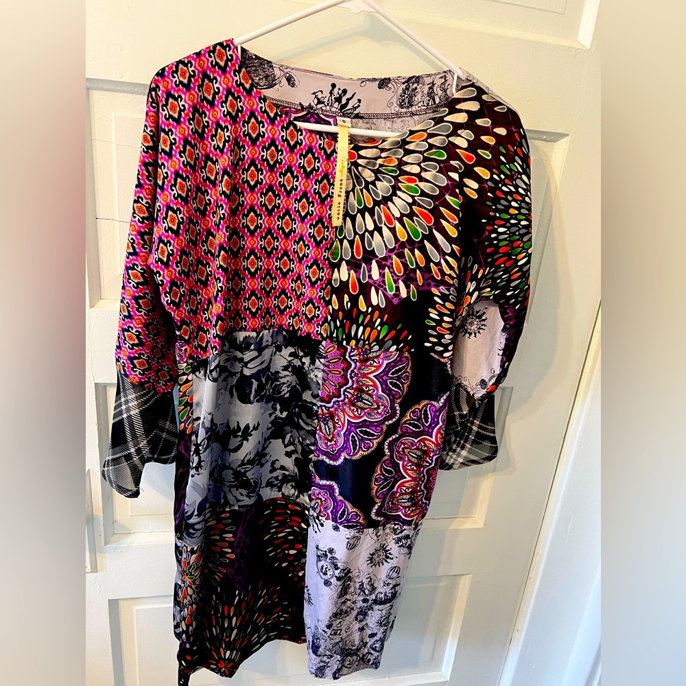 This is an uncle Frank multicolored Bohemian type dress or top.